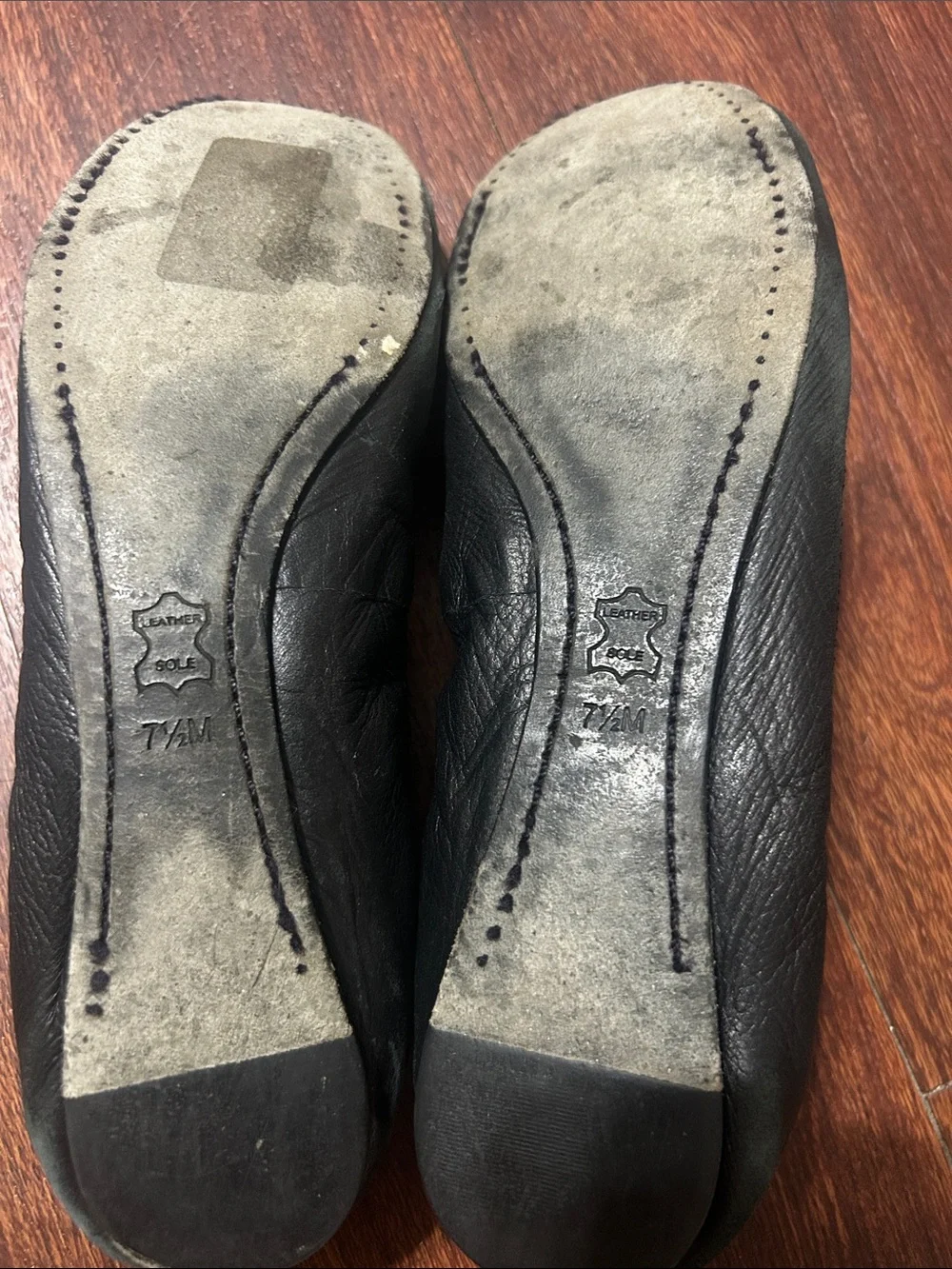 Tory Burch Black Leather Ballet Flats with Gold Logo Medallion